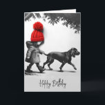 Carte Fille d'anniversaire marchant son chien<br><div class="desc">Dessin d'une jeune fille portant un grand casquette tricoté rouge 3D avec un pompon marchant avec un chien. Tout le texte peut être modifié.</div>