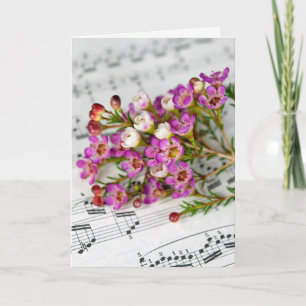 Carte fleurs roses sur la musique