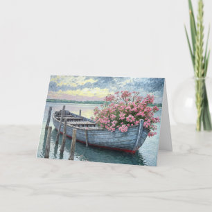 Carte Géraniums roses dans une barque en bois Sympathie