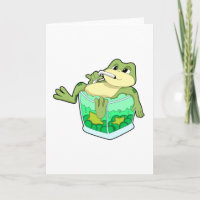 Grenouille avec verre de jus