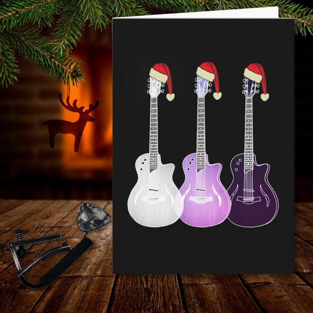 Carte Guitare électrique de Noël rose (Christmas guitars wearing santa hats pink black and white music themed holiday greetings card)