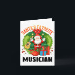 Carte Guitariste préféré du Père Noël, joueur de guitare<br><div class="desc">Quel merveilleux cadeau pour le joueur de guitare ou guitariste avec ce guitariste et musicien préféré de Santa.</div>