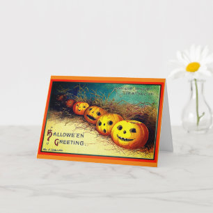 Carte Happy Halloween salutations Citrouilles dans une c