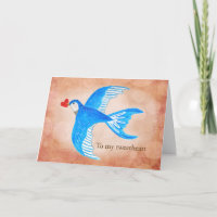 Hirondelle bleue portant un cœur rouge à mon cœur 