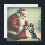 Carte Joli Père Noël vintage avec chaton<br><div class="desc">Voici une carte mignonne présentant une illustration vintage du Père Noël offrant un cadeau à un chaton dans la neige. C'est une carte douce à envoyer comme carte de Noël ou à offrir avec un cadeau ! Cette carte sera particulièrement agréable pour un amateur de chats ou quelqu'un qui aime...</div>