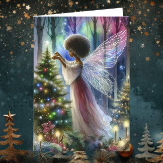 Carte Jolie fée décorant l'arbre de Noël