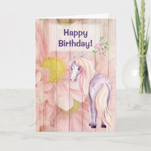 Carte Jolie poney sur les marguerites sur le bois de gra