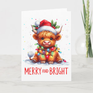 Carte Jolis éclairages de Noël de bébé vache des Highlan
