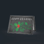 Carte Joyeuse des Fêtes | Faux Chalkboard, Holly<br><div class="desc">Cette carte de Noël ou de Fêtes, noir et blanc, bon marché et festive, a un ensemble de verdure qui a des feuilles saints et des baies et d'autres feuillages assortis sur un faux arrière - plan de tableau noir avec une fine bordure de craie blanche autour. Le libellé "Joyeuses...</div>