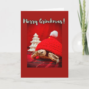 Carte Joyeuse tortue sulcata Grinchmas dans un casquette