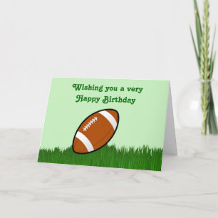 Carte Joyeux anniversaire avec football sur l'herbe