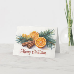 Carte Joyeux Noël avec des oranges et de la cannelle