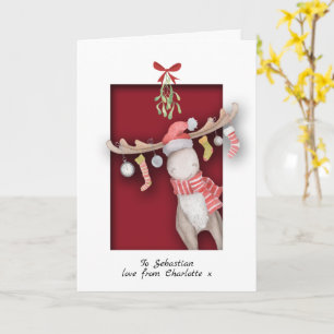 Carte Joyeux Noël avec un élan mignon et du gui