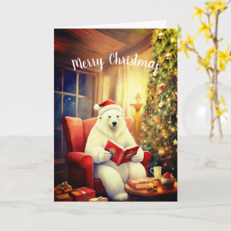 Carte Joyeux Noël Ours Lecture dans une chaise confortab