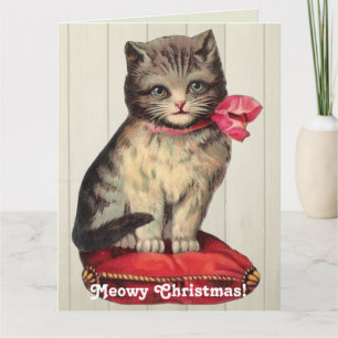 Carte Kitten de Noël assis avec un cou rouge
