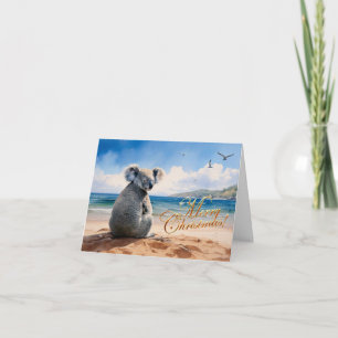 Carte Koala sur une plage de sable Joyeux Noël