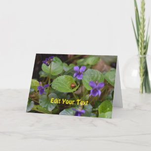 Carte Ladybug sur les fleurs de violet doux