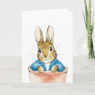 Carte Lapin assis dans un pot de plante    