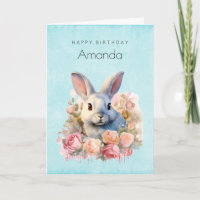 Lapin avec une guirlande de roses Joyeux Anniversa