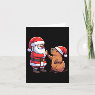 Carte Le Père Noël Capybara High-fiving Noël Toddler