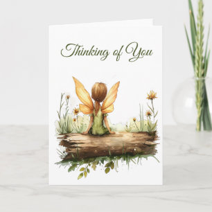 Carte Lonely Fairy assis sur un journal