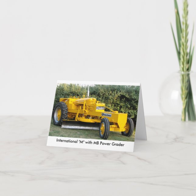 Carte "M" international avec la niveleuse de puissance (Devant)