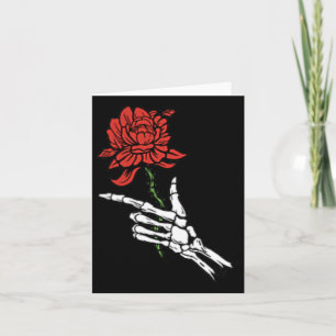 Carte Main de squelette tenant une rose rouge