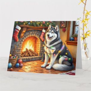 Carte Malamute d'Alaska cheminée avec lumières de Noël