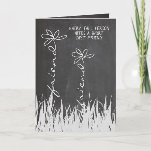 Carte marguerites d'amitié sur le tableau de bord