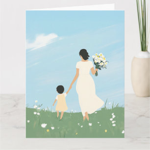 Carte Mère et enfant dans une prairie en fleurs