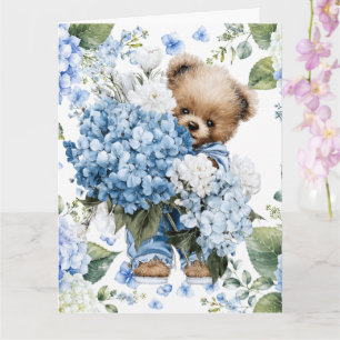 Carte Noun ours en peluche tient des fleurs d'hortensia
