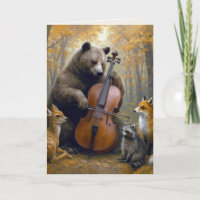 Ours d'anniversaire jouant du violoncelle dans les