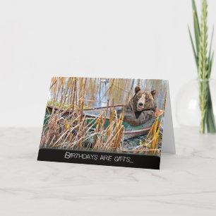 Carte ours d'anniversaire souriant dans un bateau à rame