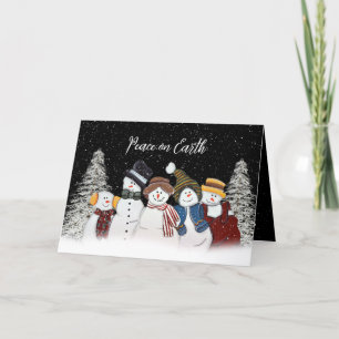 Carte Paix sur Terre Snowmen dans les flocons de neige