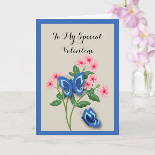 Carte Papillons bleus parmi les fleurs Saint-Valentin