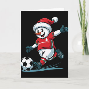 Carte Père Noël bonhomme de neige jouant au football drô