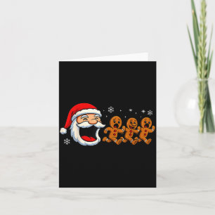 Carte Père Noël drôle poursuivant un biscuit de Noël au