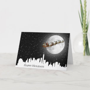 Carte Père Noël et Sleigh survolent la ville