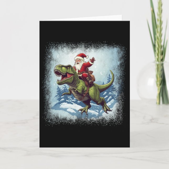Carte Père Noël montant un dinosaure T-rex Noël drôle  (Devant)