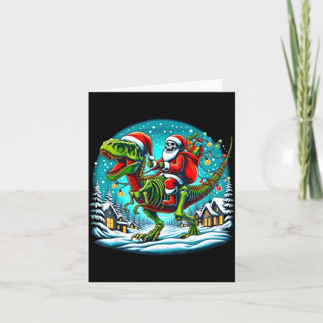 Carte Père Noël squelette chevauchant un dinosaure T Rex (Devant)