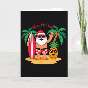 Carte Père Noël surfant sur la plage hawaïenne Noël en j