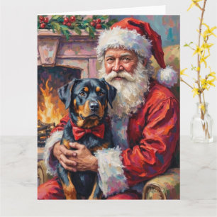 Carte Père Noël tenant l'art de Noël Rottweiler