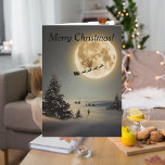 Carte Père Noël vintage sous Pleine lune renne volant<br><div class="desc">C'est une vieille carte de Noël des années 60 qui s'est renouvelée grâce à la magie de Zazzle. La carte montre Père Noël et son renne sous une pleine lune. L'immense sapin et solitaire de la scène,  feuille,  émerveillé et ébloui de la saison des fêtes.</div>