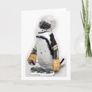 Carte Petit Penguin portant un engin de hockey