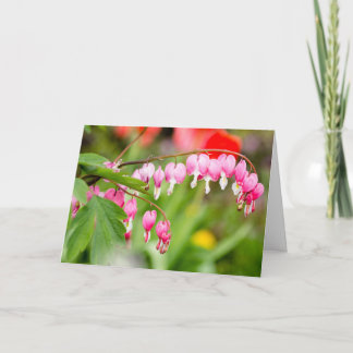 Carte Photo de fleurs cardiaques saignantes