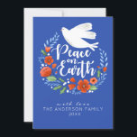 Carte photo des Fêtes de la Paix sur Terre<br><div class="desc">Une jolie carte de Noël avec une colombe dans une couronne fleurie avec les mots paix sur Terre. La carte de Noël est conçue en bleu royal, blanc et rouge. Personnalisez-le avec votre nom, l'année et votre photo de famille au dos de la carte. Conçu pour vous par Blackberry Boulevard....</div>