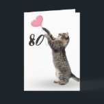 Carte playful tabby cat for 80th birthday card<br><div class="desc">Gray tabby cat with pink heart balloon for 80th birthday on white background. Background color can be changed</div>