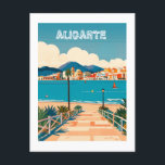 Carte Postale Alicante Espagne Beach View Voyage<br><div class="desc">Illustration vibrante et colorée d'une scène côtière pittoresque à Alicante,  Espagne. L'image présente une plage de sable qui descend vers un océan bleu clair,  avec une charmante ville côtière nichée sur fond de collines ondoyantes. Les bâtiments colorés et les palmiers apportent une touche méditerranéenne.</div>