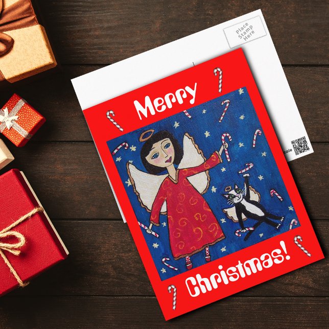 Carte postale ange et chat de Noël Candy Cane (Flying angel red dress angel cat with candy canes on dark blue and red Merry Christmas postcard.)