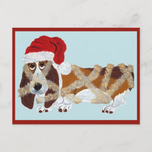 Carte Postale Basset Hound empêtré dans du ruban de Noël